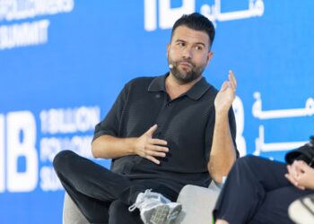 Carlos Gil, author and keynote speaker, speaking on stage at the 1 Billion Followers Summit in Dubai. The session focused on personal branding, social media strategy, and building scalable creator-led businesses through owned audiences and real-world monetization.