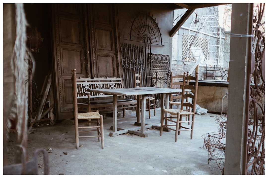Rustic wooden table and chairs in an outdoor setting